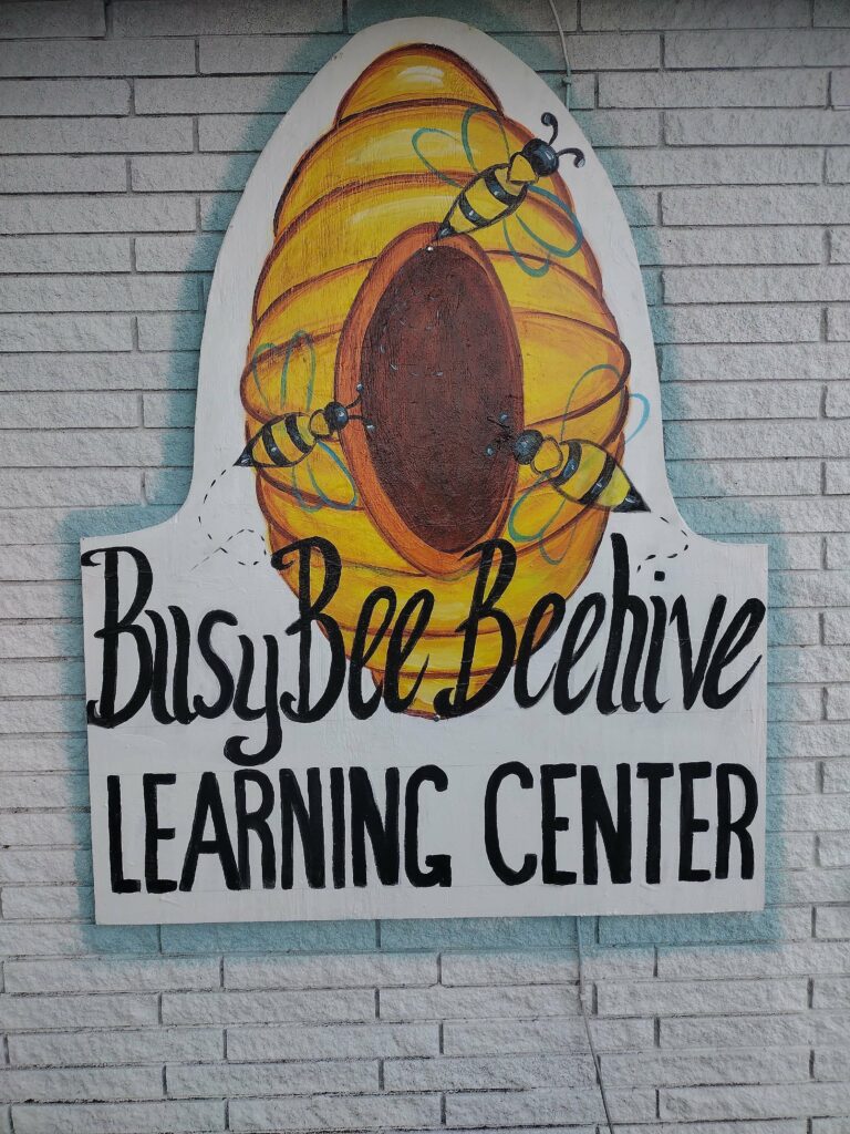 school learning center painting signage